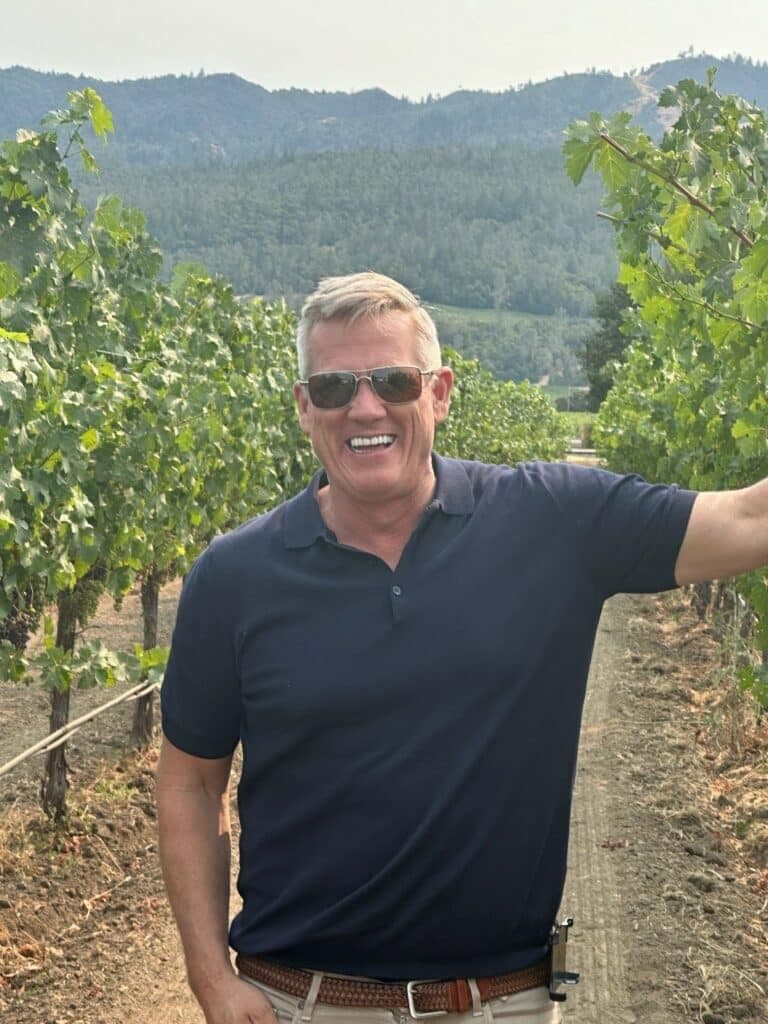 Tom Yancey standing in field