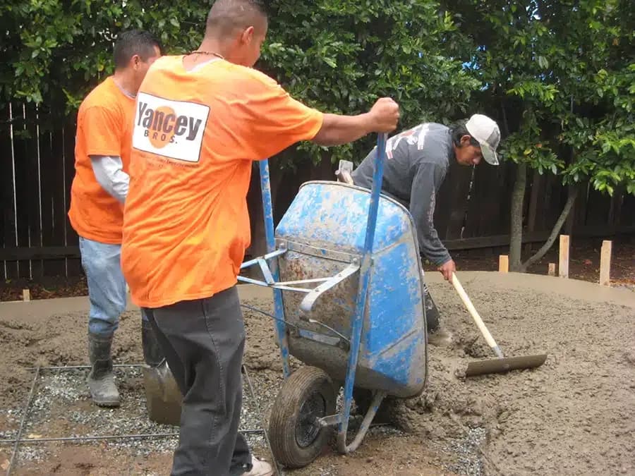 Yancey team pouring concrete
