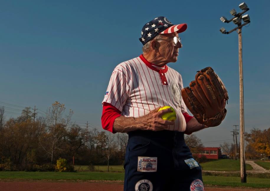 Senior man playing softball