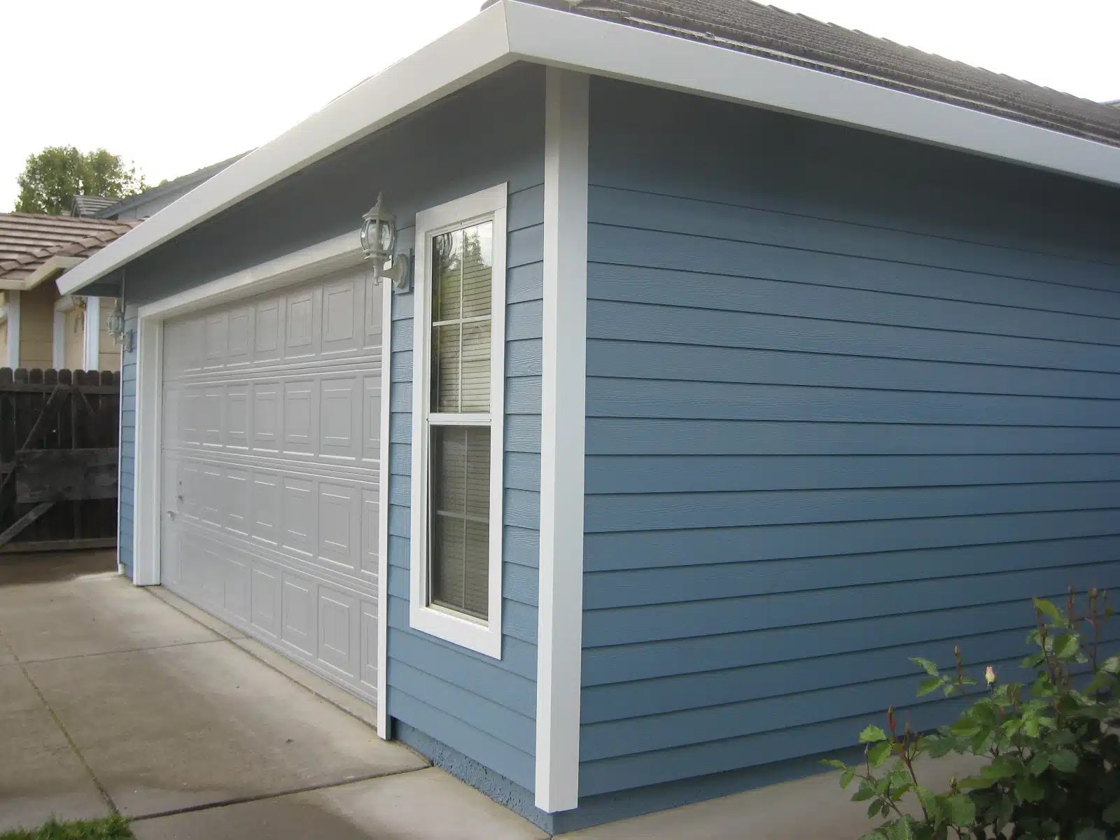 Siding on garage in residential Sacramento, CA.