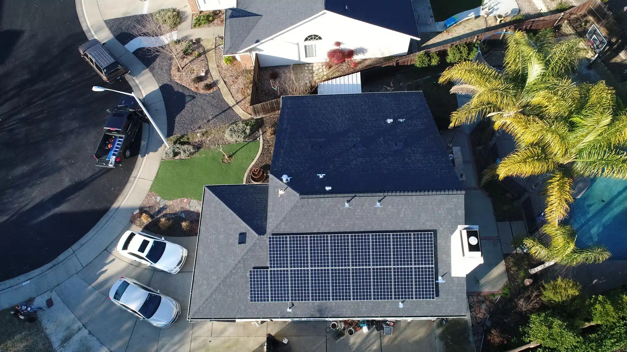 Birds eye view of solar panels on residential roof in Sacramento, CA.