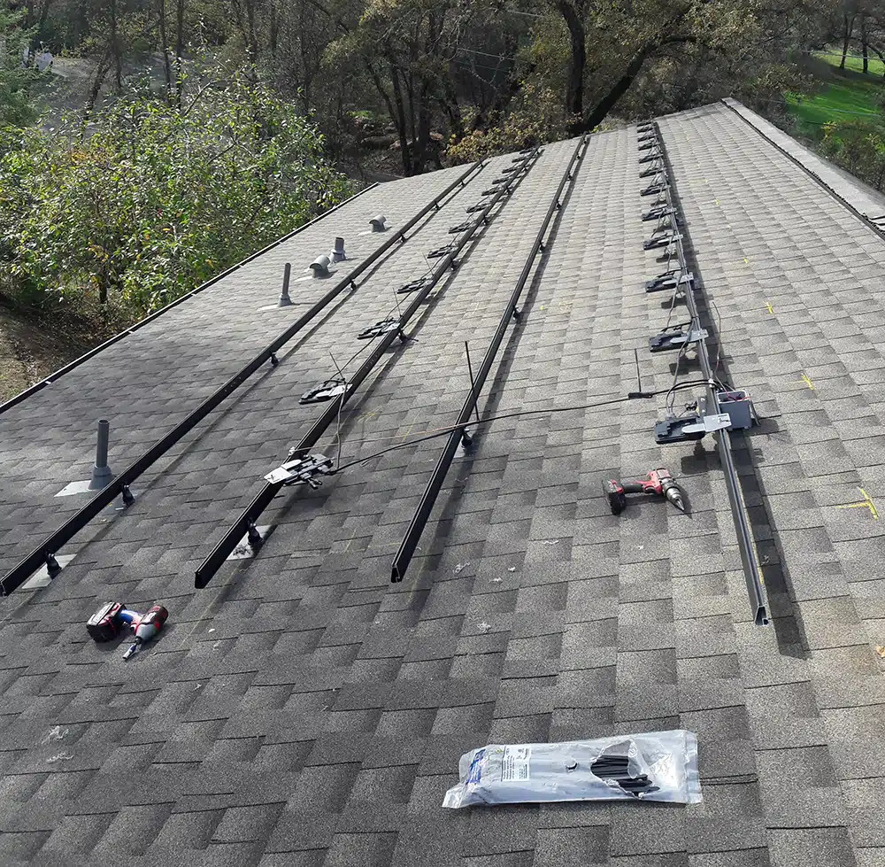 Beginning of solar panel installation on residential roof in Sacramento, CA.